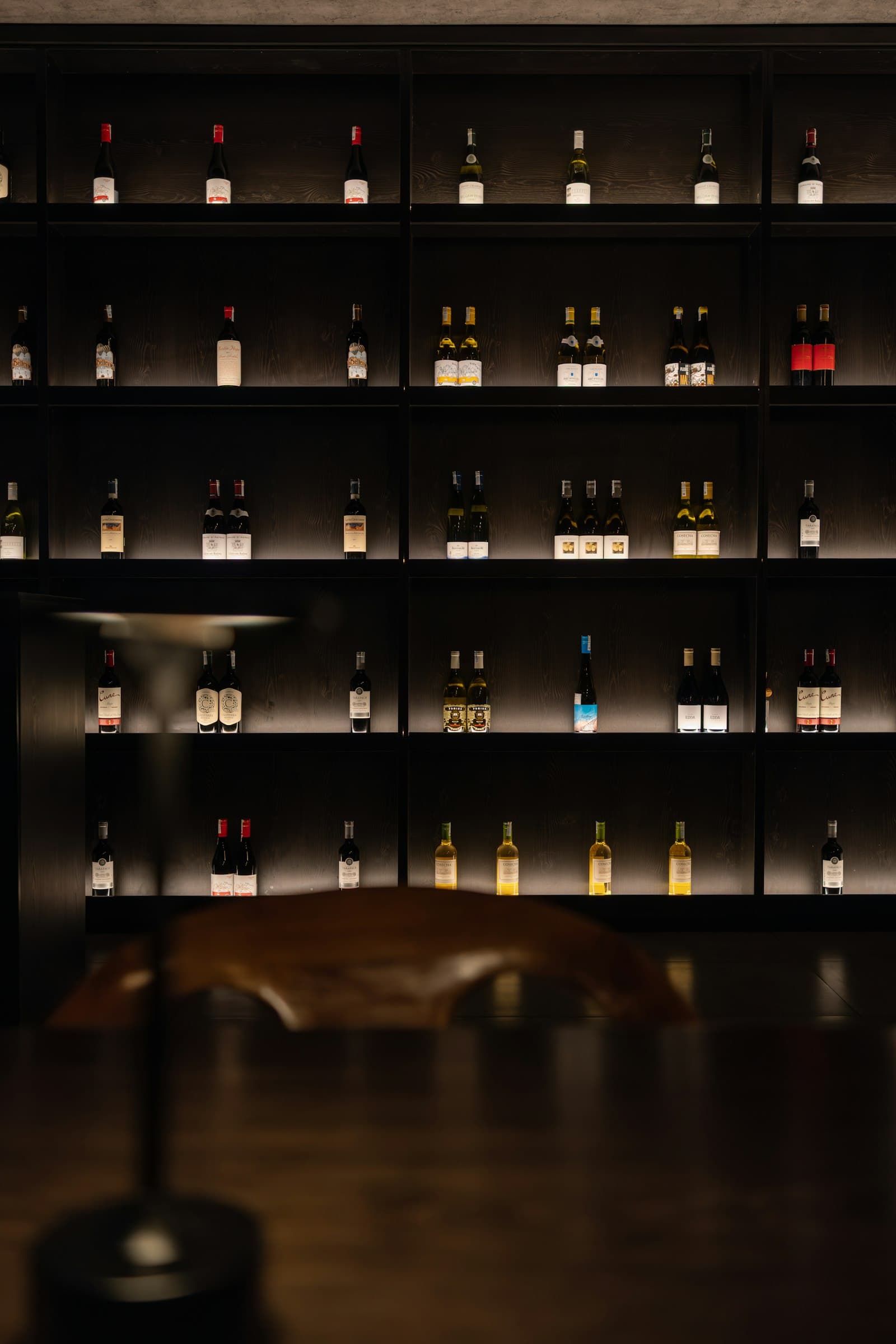 Darbin wine restaurant with illuminated wine wall